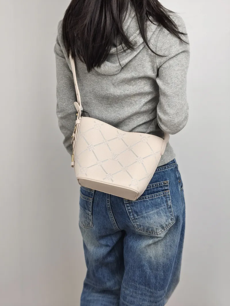 Louis Vuitton Top Handle Bag ALL IN BB White · Blue Calfskin BB 16 × 12 × 18 cm — on-model view 1 of 3