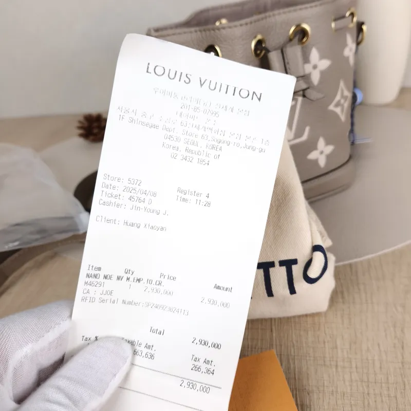 Louis Vuitton Crossbody Bag NANO NOÉ Bucket Bag Nano · White Monogram Empreinte Embossed Calfskin nano 13 × 10 × 16 cm — detail view 9 of 11