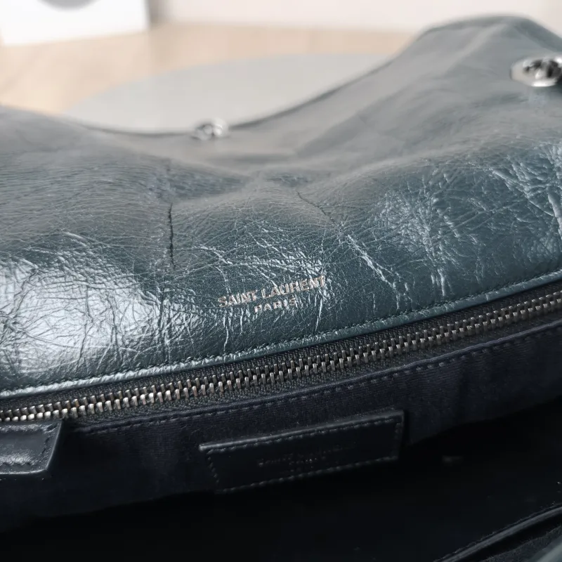 SAINT LAURENT Crossbody Bag Niki Green Waxed Leather Medium 28 × 8.5 × 20 cm — detail view 14 of 15