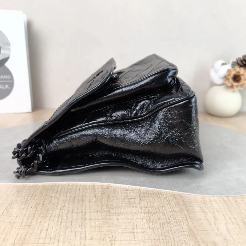 SAINT LAURENT Crossbody Bag Niki Black D Waxed Leather Calfskin Medium 28 × 8.5 × 20 cm — detail view 7 of 10
