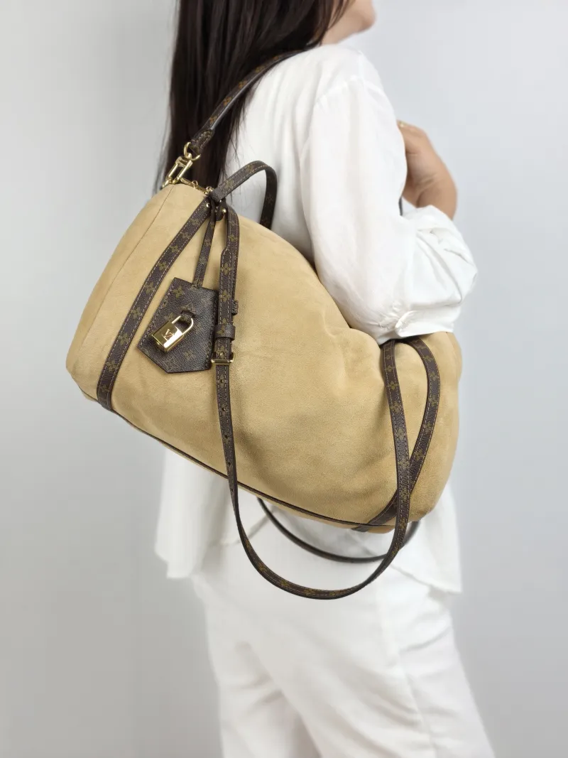 Louis Vuitton Shoulder Bag EXPRESS Shoulder Bag Suede Medium 36 × 18.5 × 24 cm — on-model view 1 of 2
