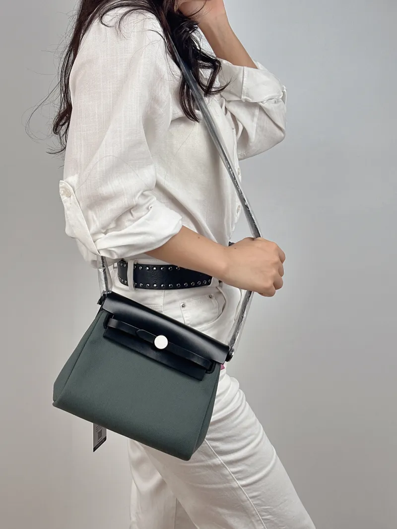 Hermès Crossbody Bag Herbag Zip 20 Calfskin，Canvas Mini 20.5 × 7 × 16.5 cm K — on-model view 1 of 2