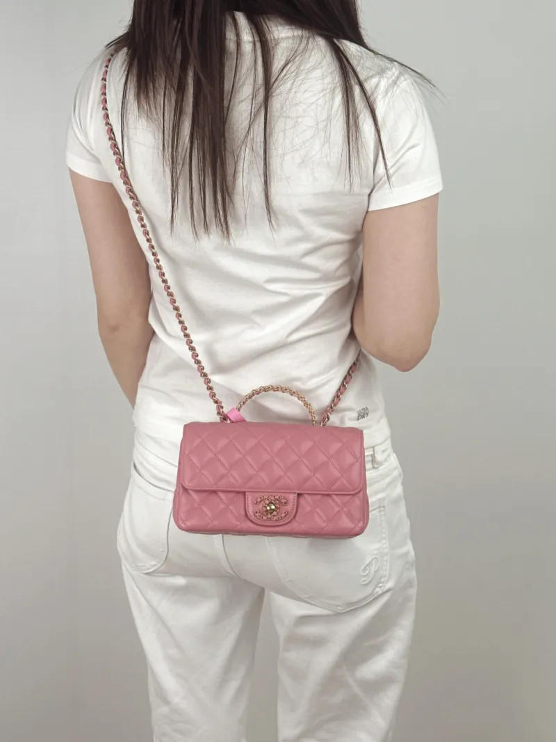 Chanel Crossbody Bag mini Lambskin mini21 × 6 × 12 cm — on-model view 2 of 3
