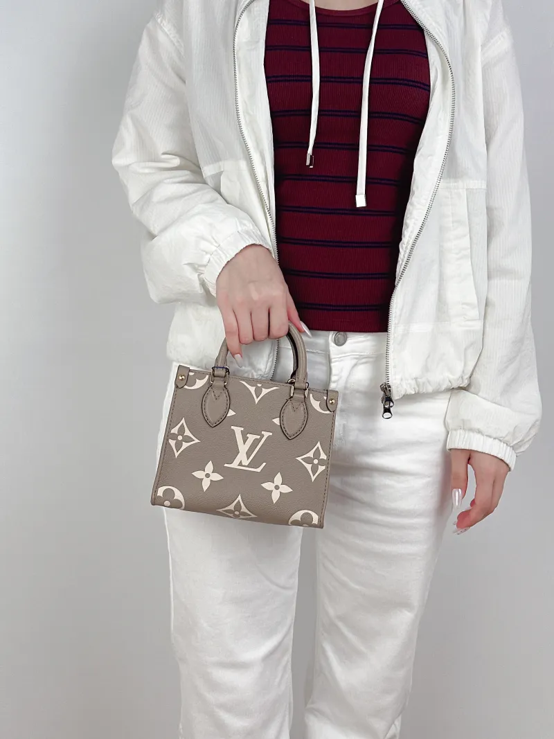 Louis Vuitton Crossbody Bag Onthego BB · White Empreinte Embossed Calfskin Monogram BB18 × 8.5 × 15 cm — on-model view 2 of 3
