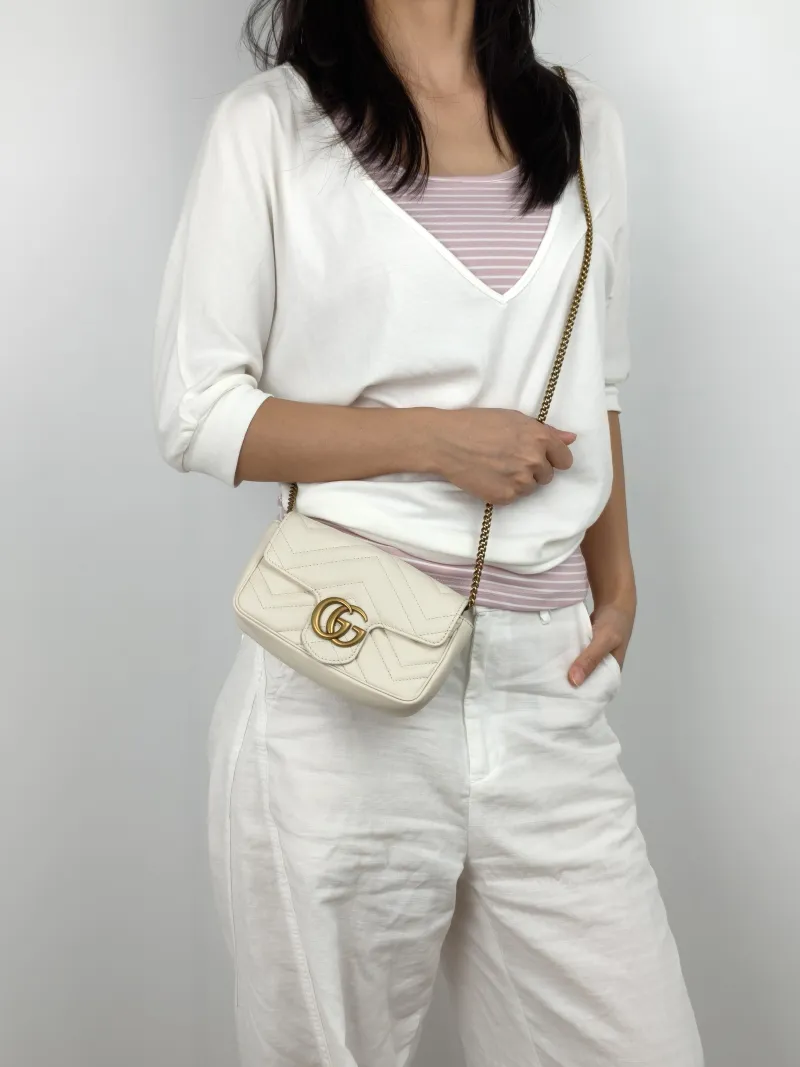 GUCCI Crossbody Bag GG Marmont Mini Marmont Mini White Calfskinmini16.5 × 4.5 × 9.5 cm — on-model view 2 of 3