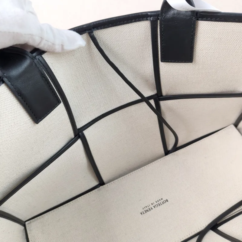 Bottega Veneta Top Handle Bag Arco Woven Tote Bag Beige · Black Canvas Medium36.5 × 14 × 24 cm — detail view 1 of 10
