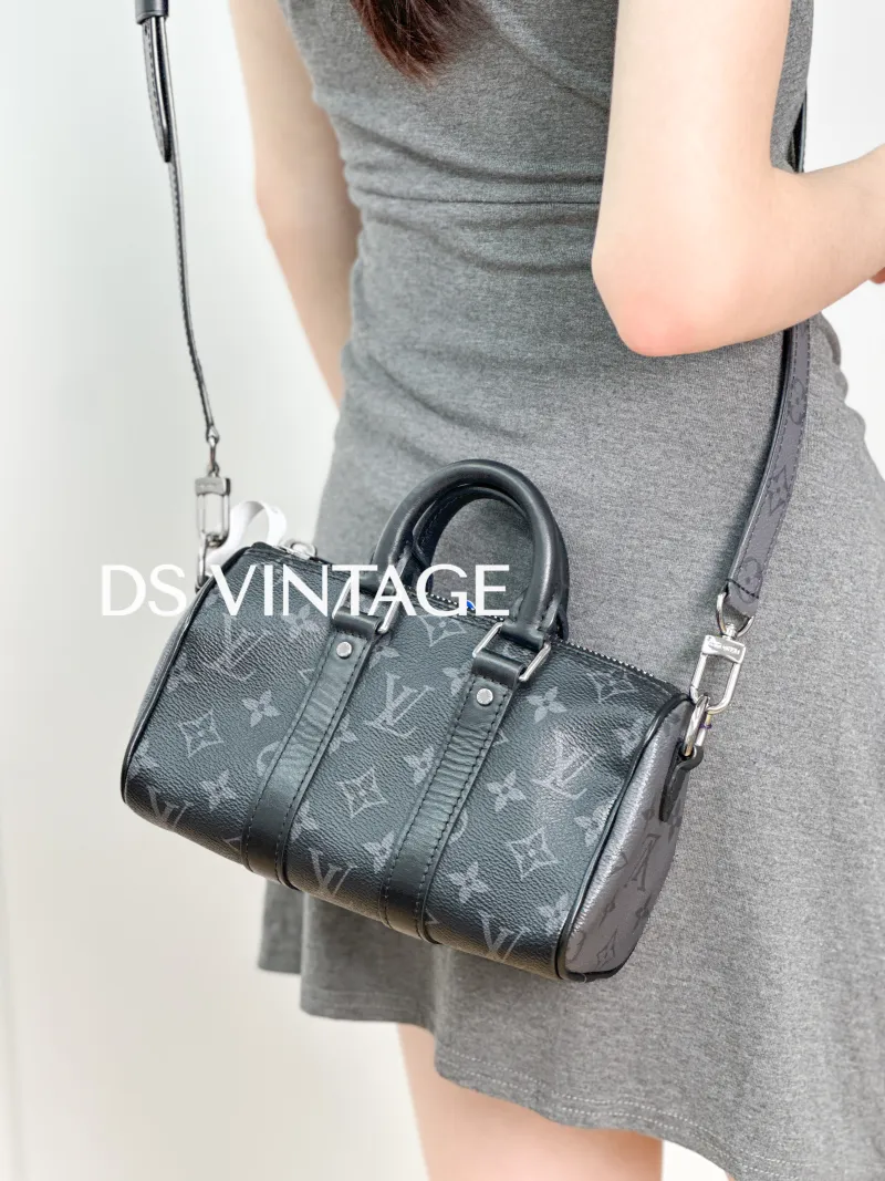 Louis Vuitton Crossbody Bag Keepall XS Monogram PVC Mini 21 × 9 × 12 cm — on-model view 6 of 6