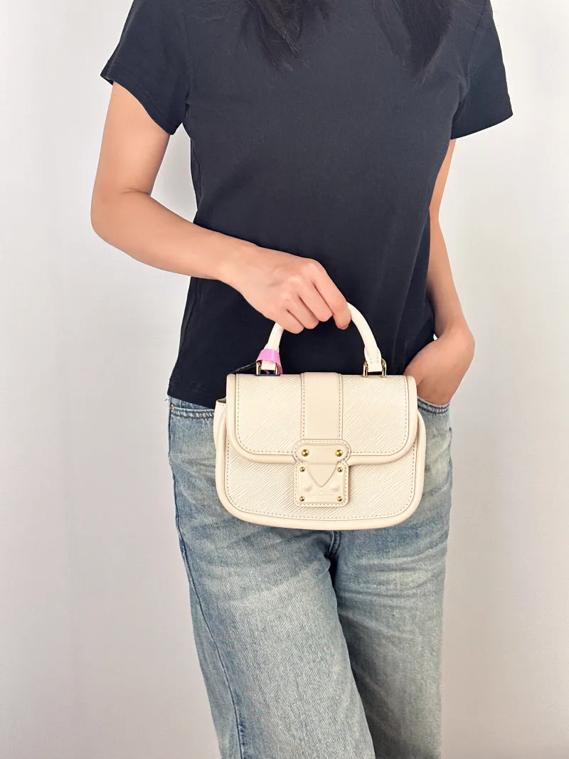 Louis Vuitton Crossbody Bag Hide and Seek Messenger Bag White Epi Embossed Calfskin One Size21 × 8 × 15 cm — on-model view 1 of 3