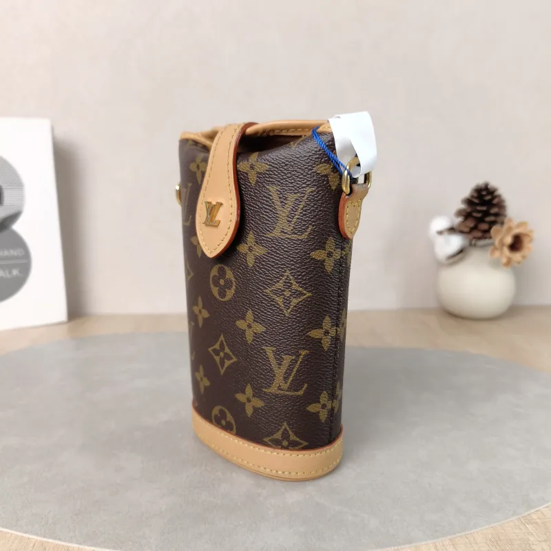 Louis Vuitton Crossbody Bag Fold Me Monogram PV Cmini14.5 × 6.5 × 18 cm — cover view 5 of 5