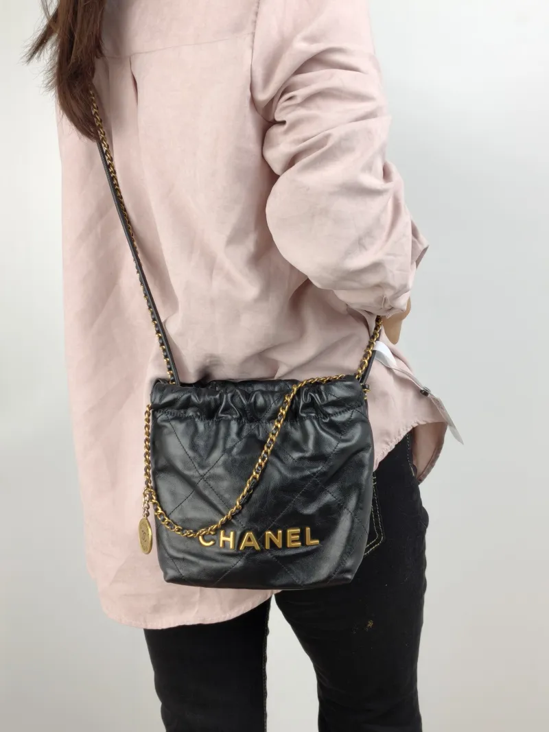 Chanel Shoulder Bag 22Bag Black CC alfskin Mini 20 × 6 × 19 cm — on-model view 2 of 2