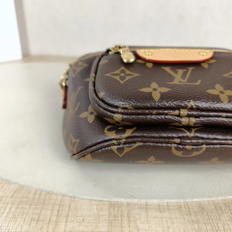 Louis Vuitton Crossbody Bag Bumbag Belt Bag Monogram PVC Mini 17 × 9.5 × 12 cm — detail view 2 of 10