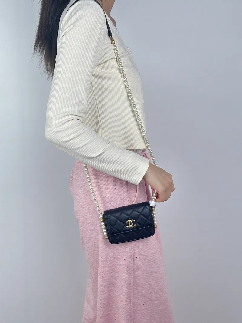 Chanel Crossbody Bag Pearl Crossbody Bag Black Calfskin One Size12 × 4 × 9 cm — on-model view 2 of 2