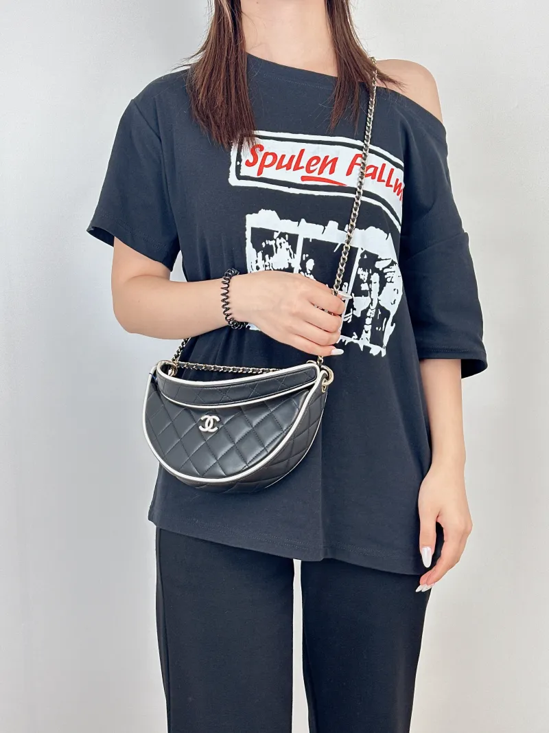 Chanel Crossbody Bag26s Top Handle Crossbody Bag Lambskin One Size22 × 6 × 15 cm — on-model view 3 of 3