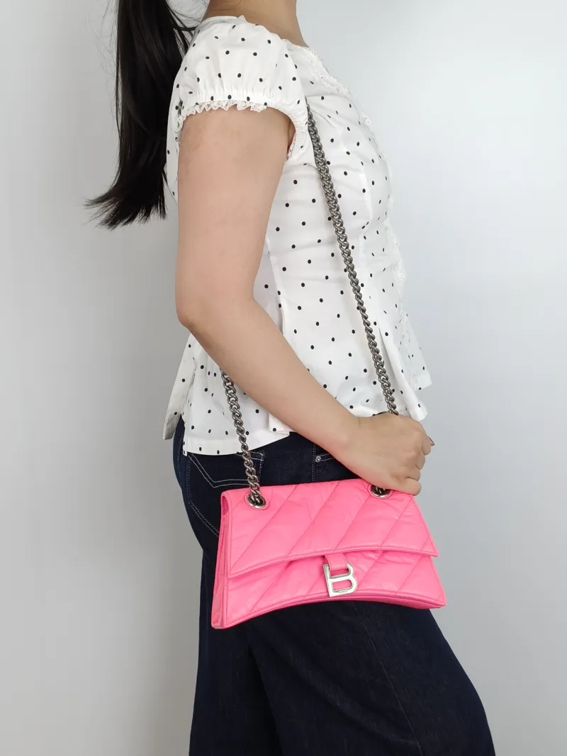 BALENCIAGA Shoulder Bag CRUSH Chain Bag Neon Pink Calfskin Small25 × 8 × 15 cm — on-model view 1 of 3