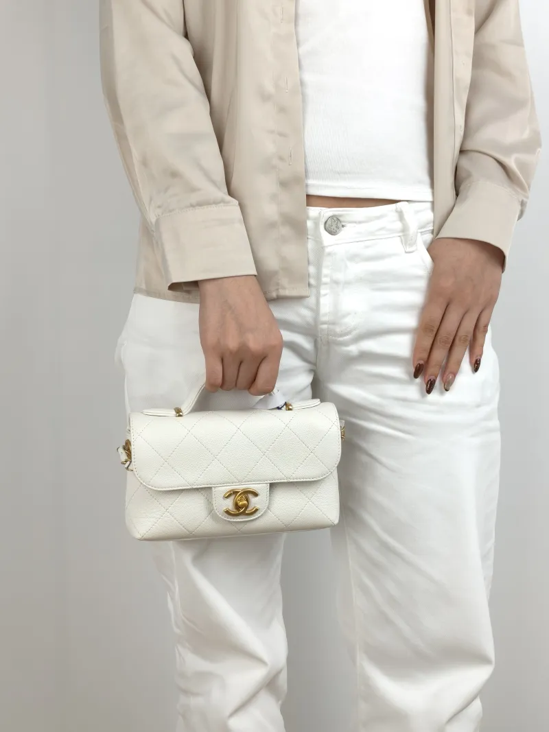 Chanel Crossbody Bag 25k cf Collection Top Handle Bag White Gold Grained Calfskin One Size 20 × 5 × 13 cm — on-model view 2 of 3