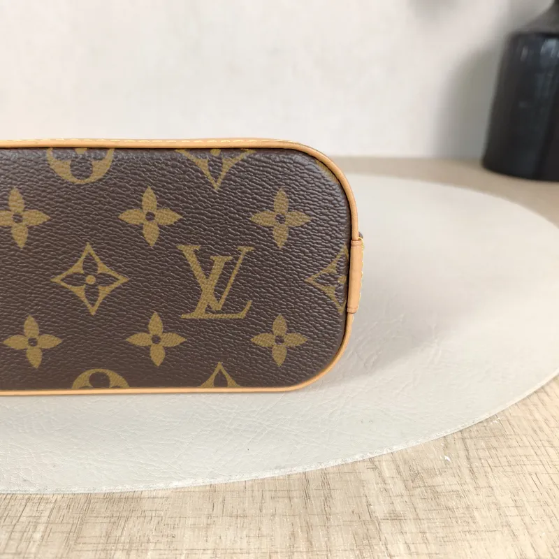 Louis Vuitton Crossbody Bag Alma Nano Monogram PVC nano 18 × 8 × 12 cm — detail view 6 of 10