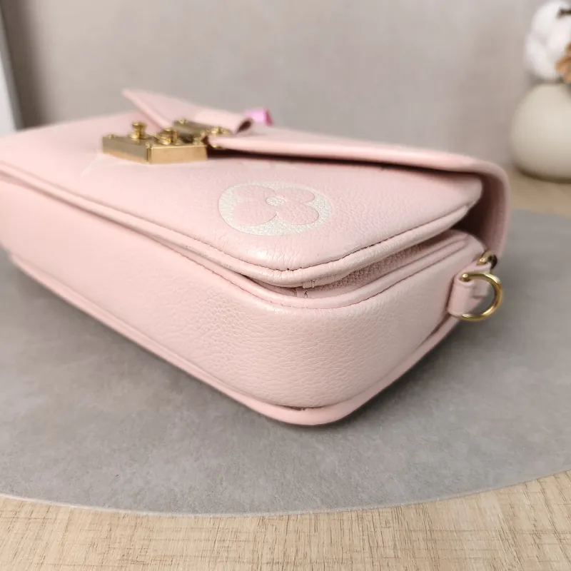 Louis Vuitton Crossbody Bag Pochette Métis East West Monogram Empreinte Embossed Calfskin Small 21.5 × 6 × 13.5 cm — detail view 8 of 14
