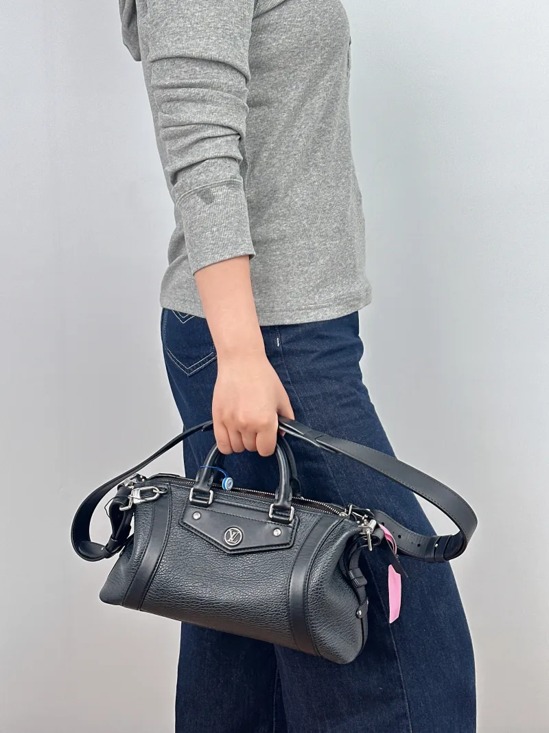Louis Vuitton Top Handle Bag BIKER Black Lambskin Small 30 × 12 × 12 cm — on-model view 2 of 2