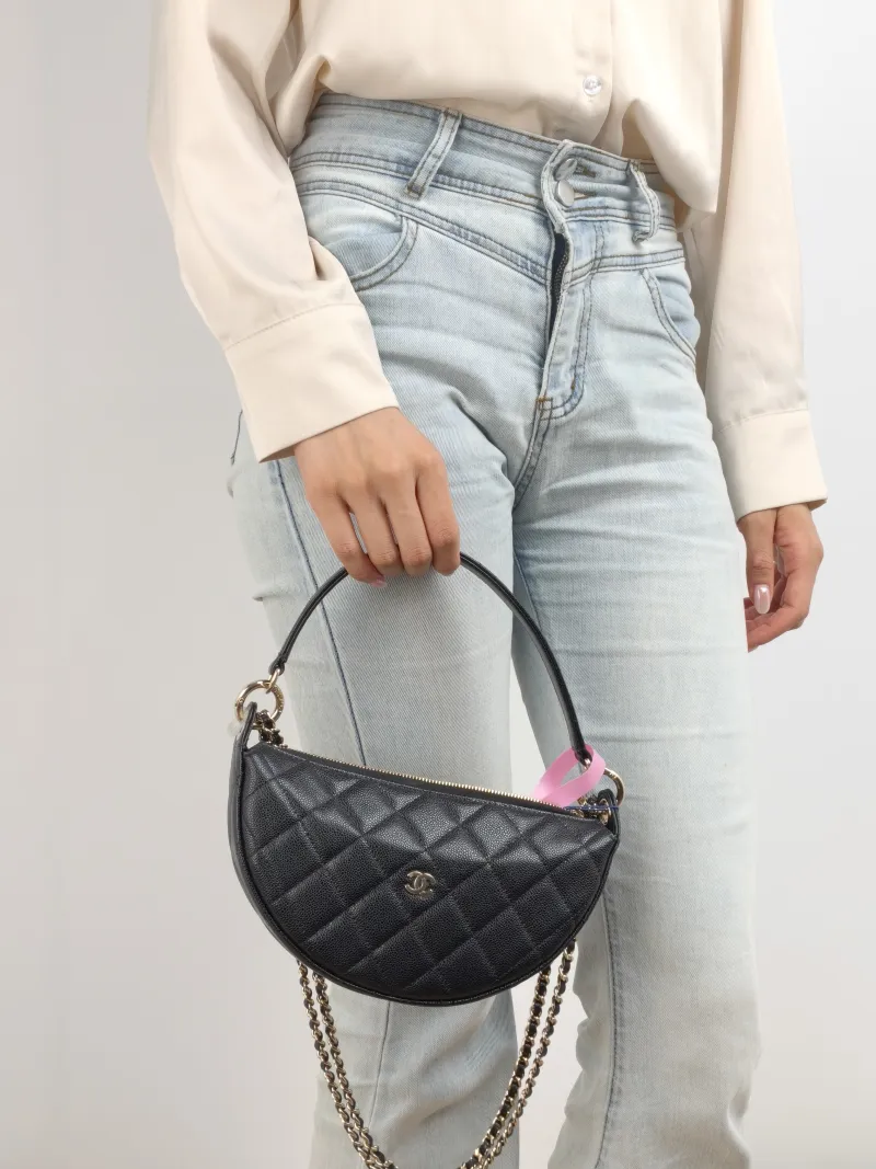 Chanel Crossbody Bag Top Handle Crossbody Bag Black Grained Calfskin One Size 22 × 5 × 15 cm — on-model view 1 of 2