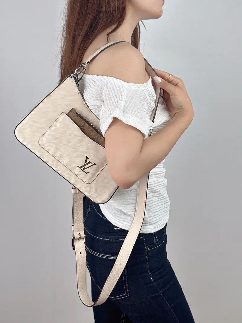 Louis Vuitton Crossbody Bag MARELLE White Epi Embossed Calfskin Small25 × 8 × 15 cm — on-model view 1 of 2