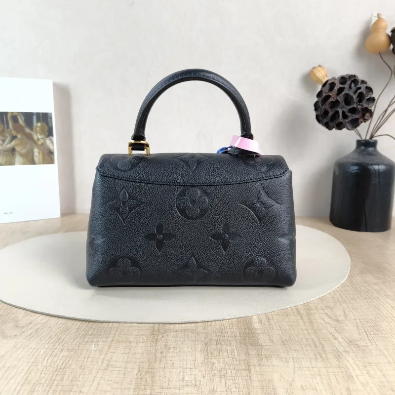 Louis Vuitton Crossbody Bag MADELEINE Black Empreinte Embossed Calfskin BB 24 × 8.5 × 17 cm — cover view 4 of 6