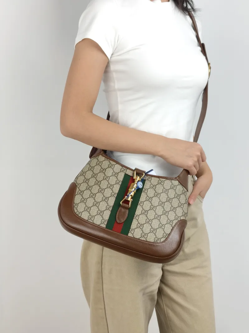 GUCCI Shoulder Bag Jackie 1961Collection Monogram PVC Medium 27.5 × 4 × 19 cm — on-model view 2 of 3