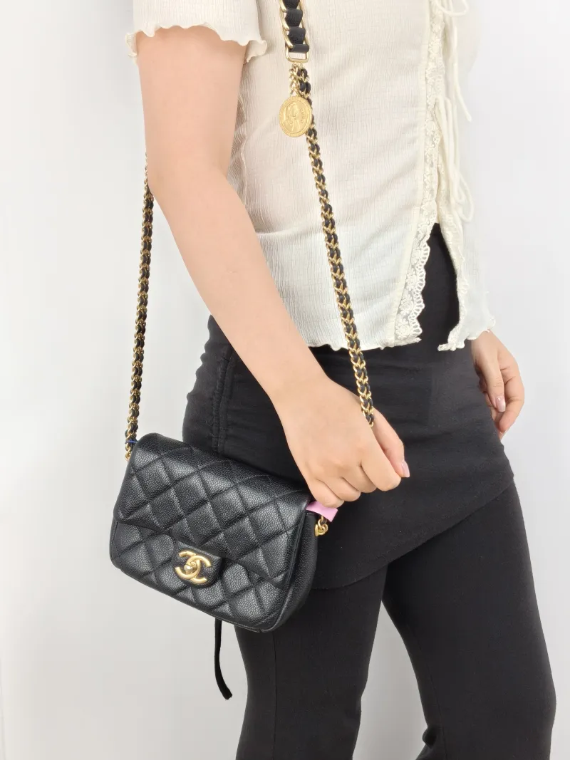 Chanel Crossbody Bag Black Grained Calfskin 19 × 6 × 14 cm — on-model view 1 of 2