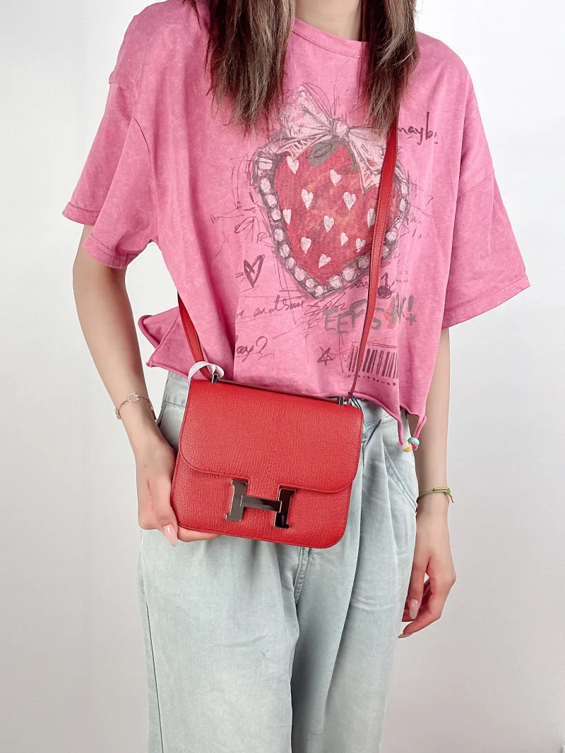 Hermès Crossbody Bag Constance 19 Silver-Tone Hardware36 Red Lambskinmini18 × 4 × 15 cm — on-model view 2 of 2
