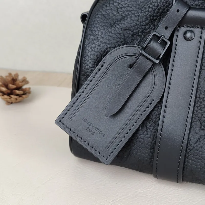 Louis Vuitton Crossbody Bag Keepall 25 Taurillon Embossed Calfskin Monogram Medium25 × 11 × 15 cm — detail view 7 of 12