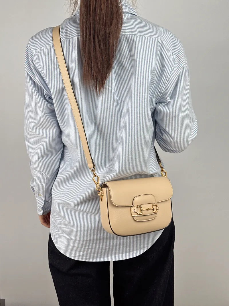 GUCCI Crossbody Bag Horsebit 1955 Horsebit Small Beige Calfskin Small 20.5 × 5 × 14.5 cm — on-model view 1 of 2