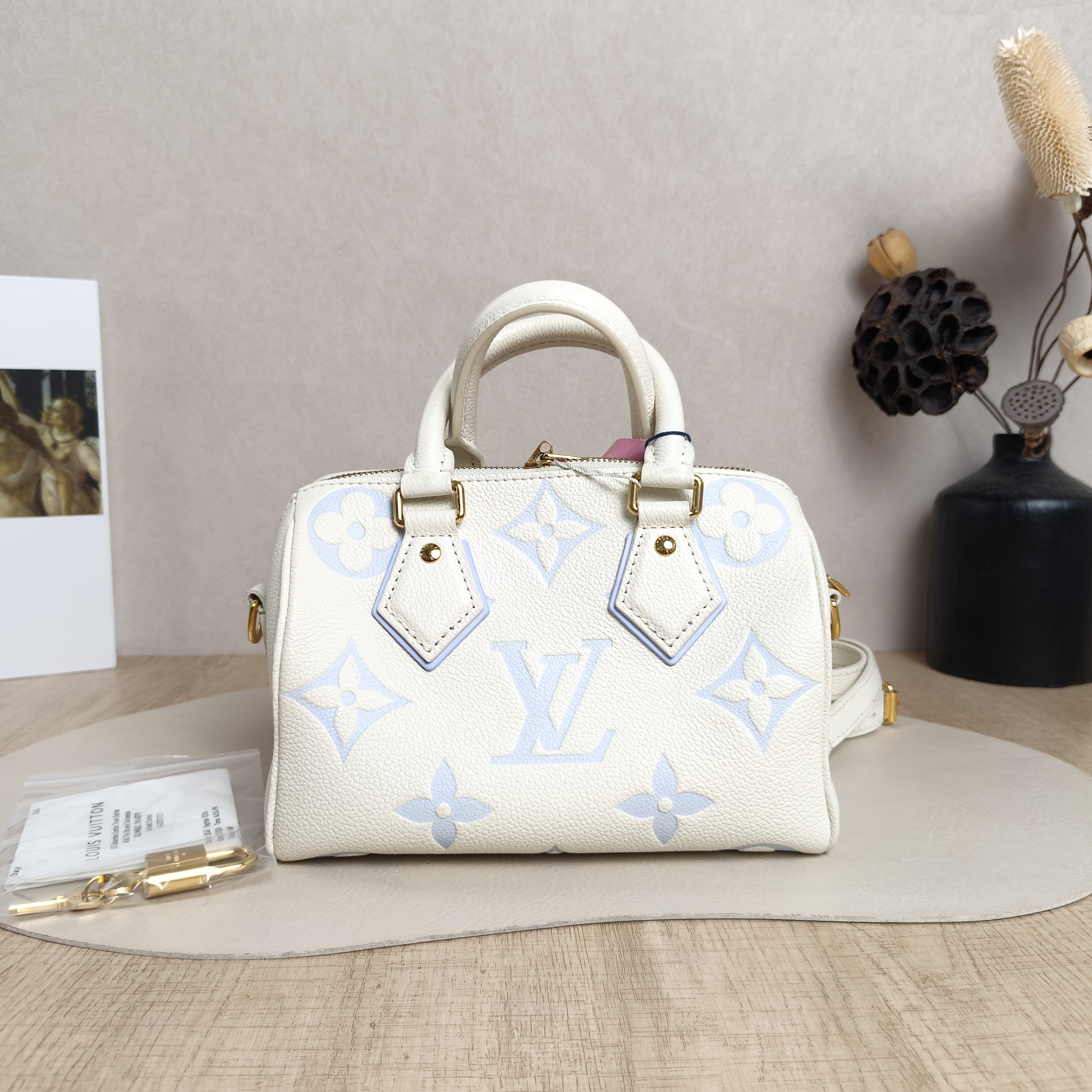 Louis Vuitton Crossbody Bag Speedy20 White · Blue Empreinte Embossed Calfskin Monogram Small20.5 × 12 × 13.5 cm — cover view 6 of 6