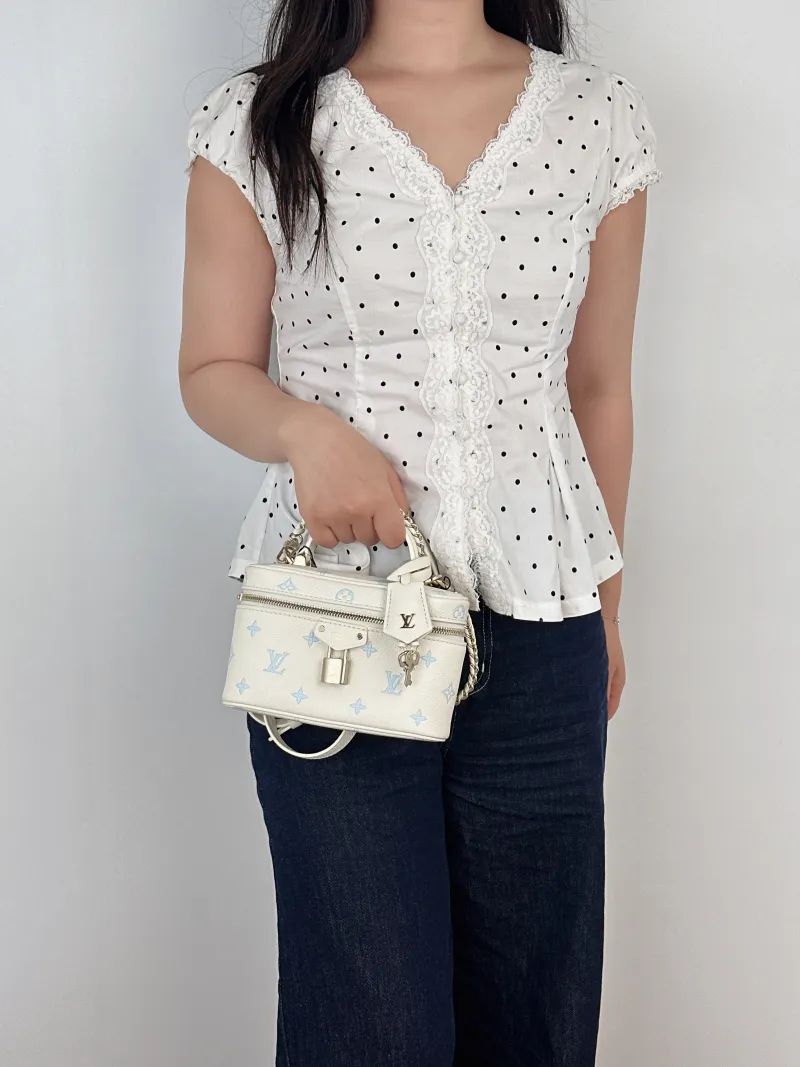 Louis Vuitton Shoulder Bag VANITY POUCH Cosmetic Bag White · Blue Calfskin One Size19 × 6.5 × 11.5 cm — on-model view 2 of 3