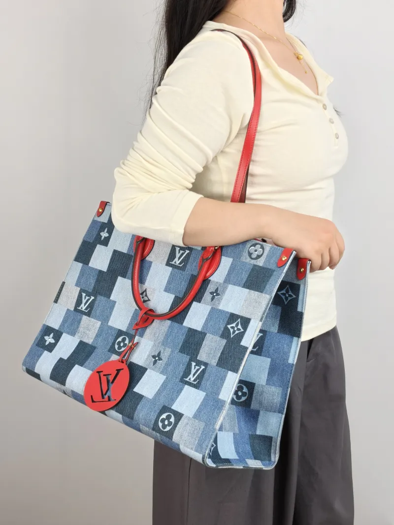Louis Vuitton Top Handle Bag Onthego Large Blue Red Large 41 × 19 × 34 cm — on-model view 2 of 2
