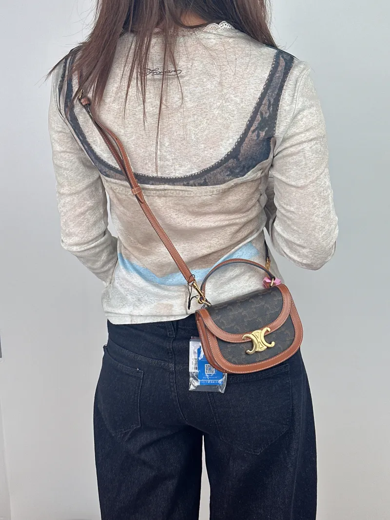 CELINE Crossbody Bag Crossbody Bag Monogram PV Cmini15 × 5 × 11.5 cm — on-model view 3 of 3