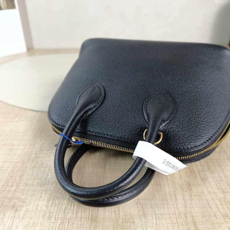 Hermès Crossbody Bag Bolide 1923 Top Handle Bag Black Lambskin Mini 18 × 8 × 15 cm K — detail view 1 of 11