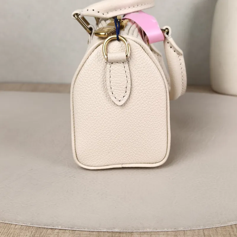 Louis Vuitton Crossbody Bag Speedy Nano White · Pink Empreinte Embossed Calfskin nano 16 × 7.5 × 10 cm — detail view 10 of 10