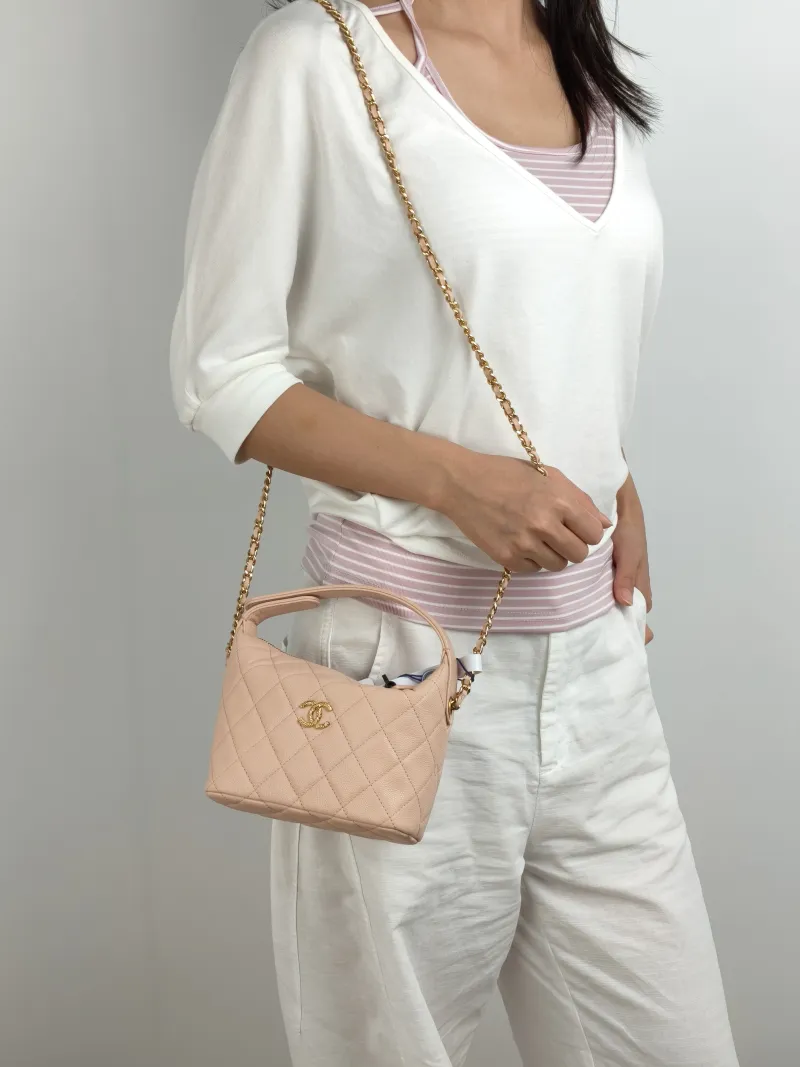 Chanel Crossbody Bag Crossbody Bag Pink Gold-Tone Hardware Grained Calfskin One Size 21.5 × 7.5 × 19 cm — on-model view 3 of 3