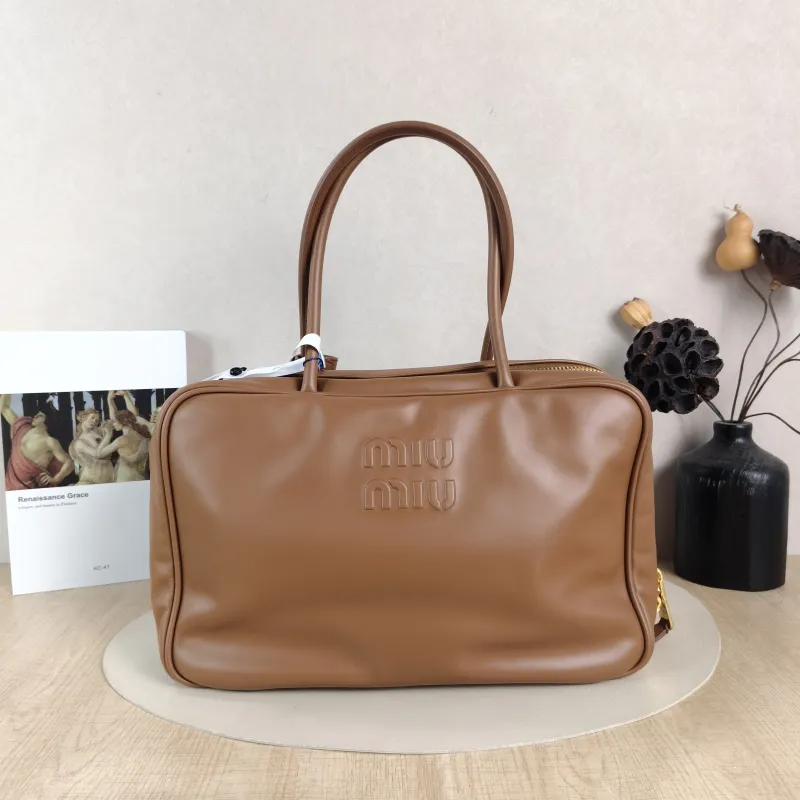 Miumiu Top Handle Bag Beau CC alfskin Large 34 × 10 × 23 cm