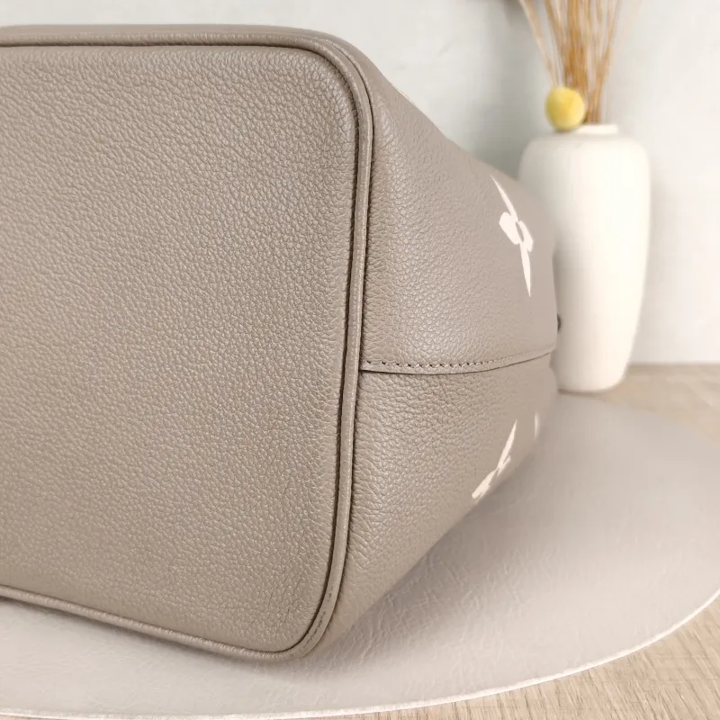 Louis Vuitton Shoulder Bag NÉONOÉ Bucket Bag · White Monogram Empreinte Embossed Calfskin Medium 26 × 17.5 × 26 cm — detail view 3 of 13