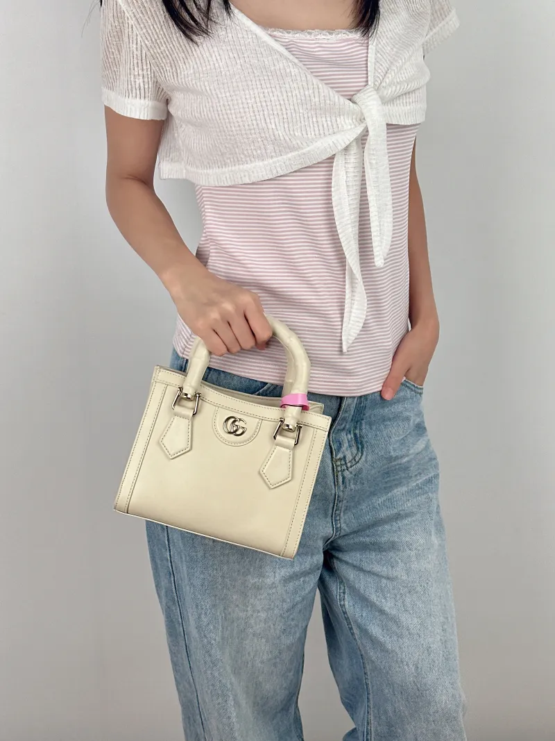 GUCCI Top Handle Bag Diana Top Handle Bag White Calfskin One Size20 × 9.5 × 16 cm — on-model view 3 of 3