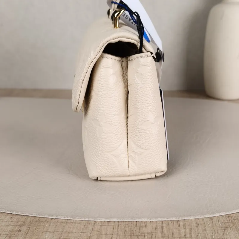 Louis Vuitton Crossbody Bag MADELEINE White Empreinte Embossed Calfskinnano21 × 6 × 12.5 cm — detail view 9 of 11