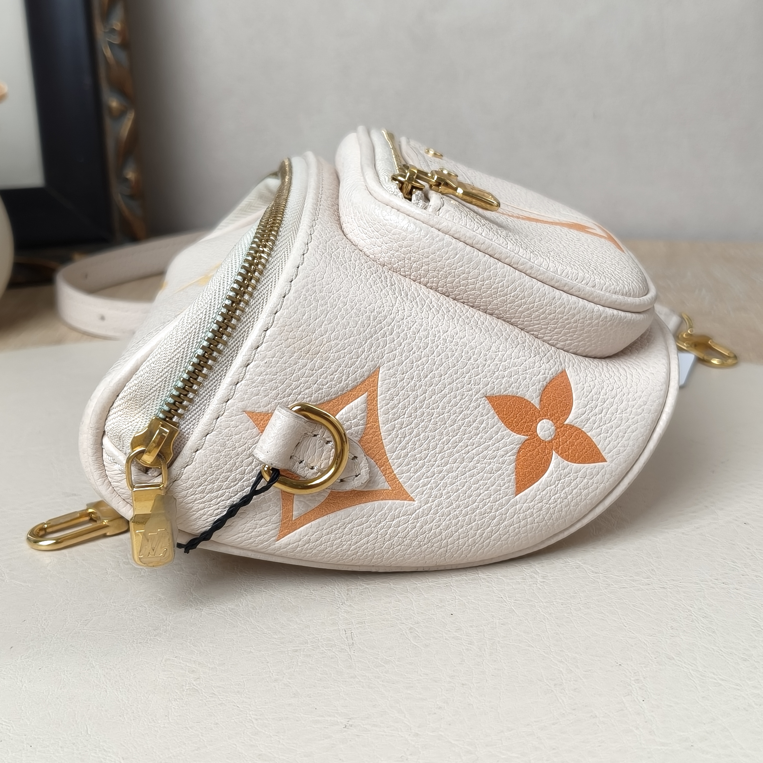 Louis Vuitton Belt Bag mini Beige Calfskin Microchip Edition · Two Straps · 17 × 9.5 × 12 cm — cover view 4 of 9