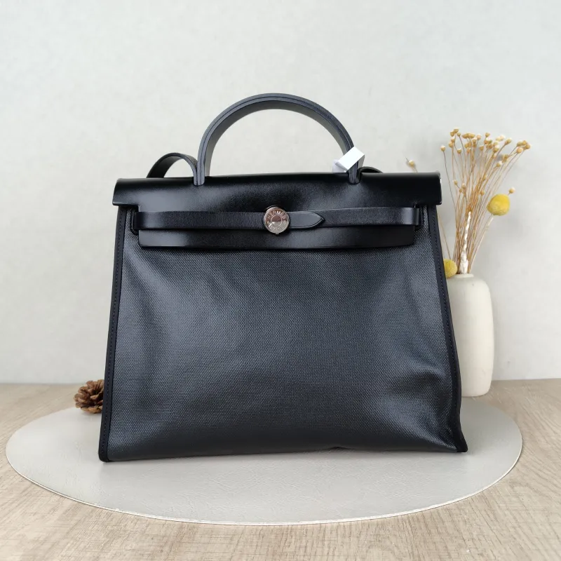 Hermès Crossbody Bag Herbag 31Black · White Canvas Medium30.5 × 11 × 25.5 cm