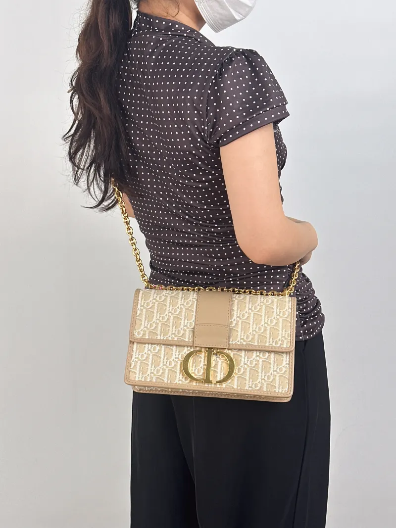 DIOR Crossbody Bag30Montaigne 30Beige Canvas Medium25 × 9 × 16.5 cm — on-model view 2 of 3