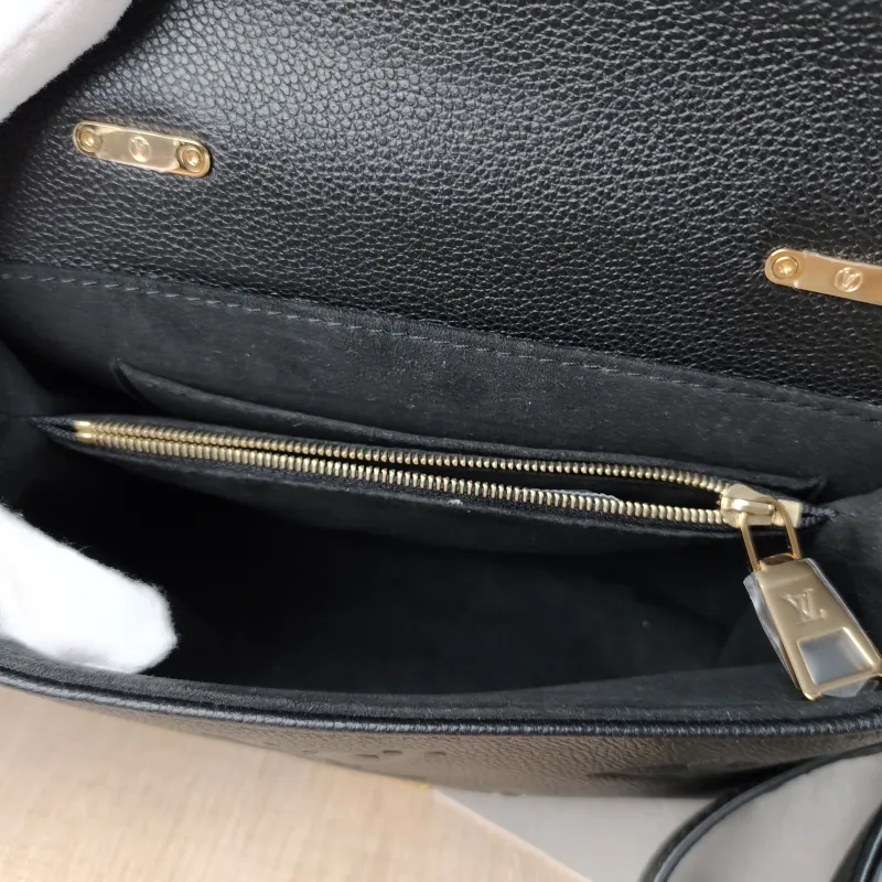 Louis Vuitton Crossbody Bag MADELEINE Black Monogram Empreinte Embossed Calfskin BB 24 × 8.5 × 17 cm — detail view 11 of 12