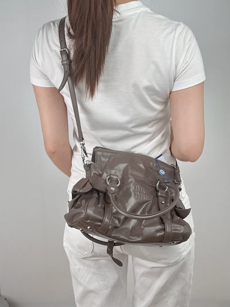 Miumiu Shoulder Bag Ribbon Grey Waxed Leather Small27 × 13 × 16 cm — on-model view 1 of 2