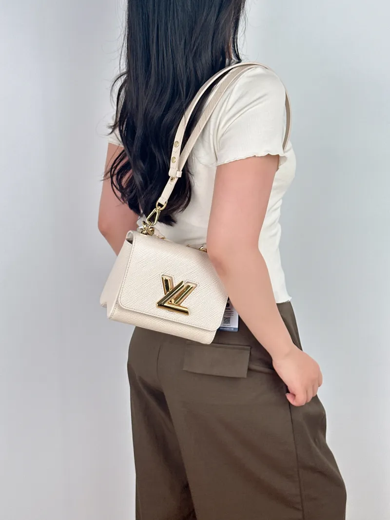 Louis Vuitton Crossbody Bag Twist White Epi Embossed Calfskin Small19 × 9 × 15 cm — on-model view 1 of 3