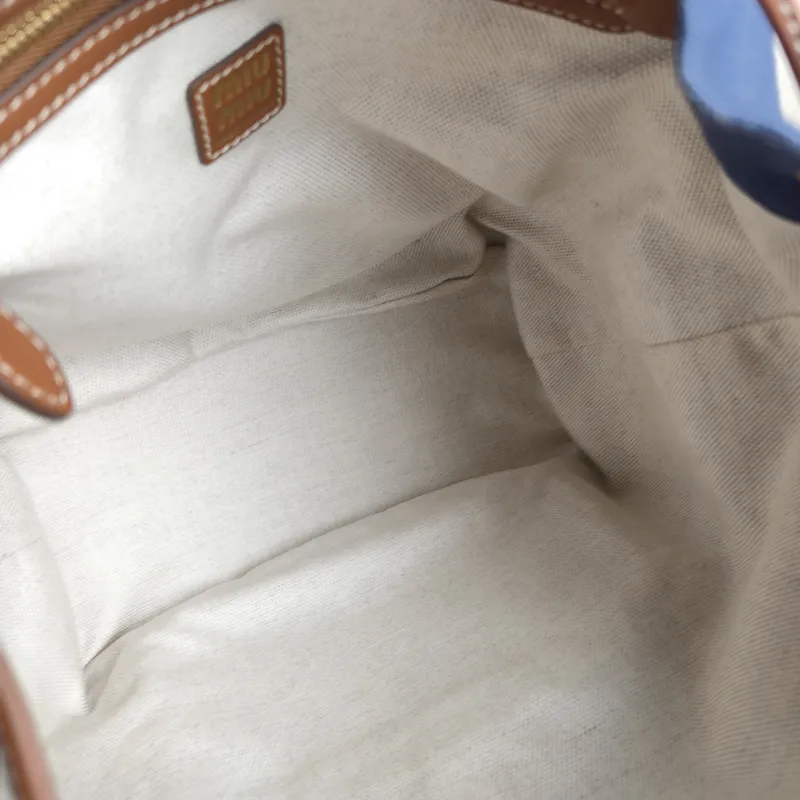 Miumiu Backpack Backpack Blue Canvas Large 25 × 12.5 × 29.5 cm — detail view 1 of 12