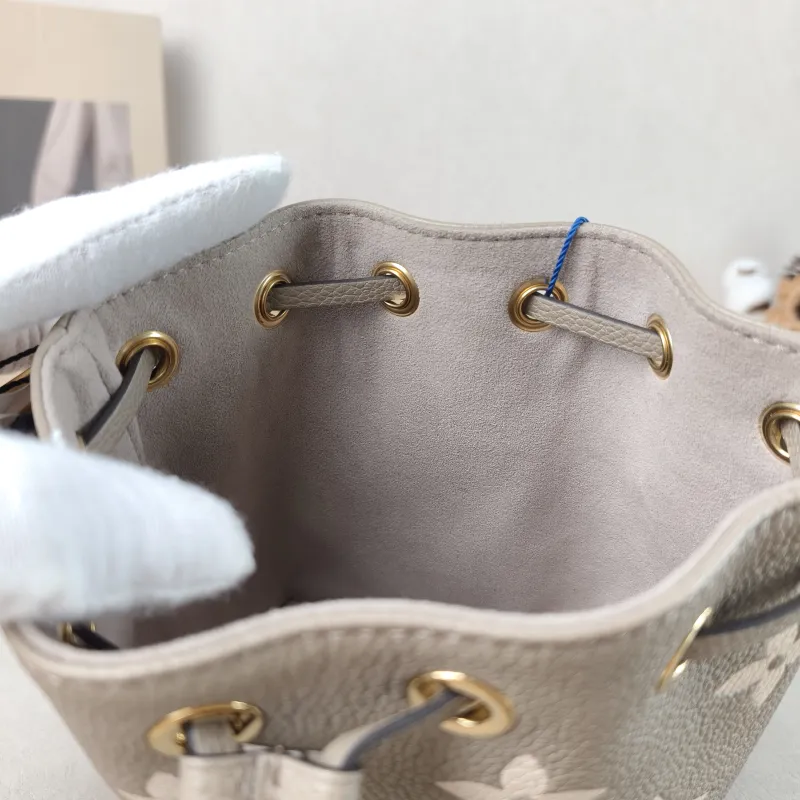 Louis Vuitton Crossbody Bag NANO NOÉ Bucket Bag Nano · White Monogram Empreinte Embossed Calfskin nano 13 × 10 × 16 cm — detail view 2 of 10