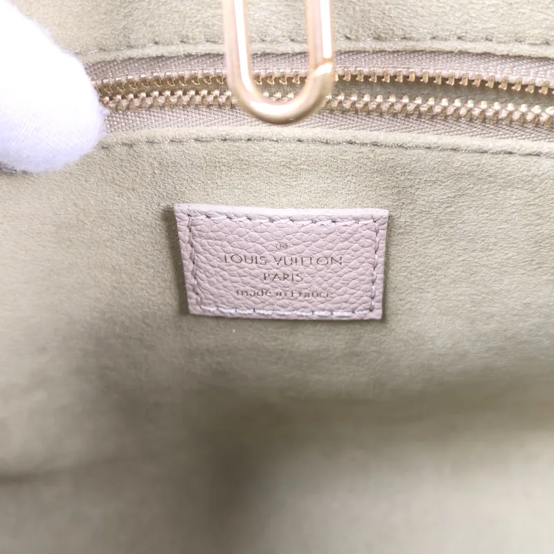 Louis Vuitton Top Handle Bag Onthego Monogram Empreinte Embossed Calfskin Small 25 × 11.5 × 19 cm — detail view 9 of 10